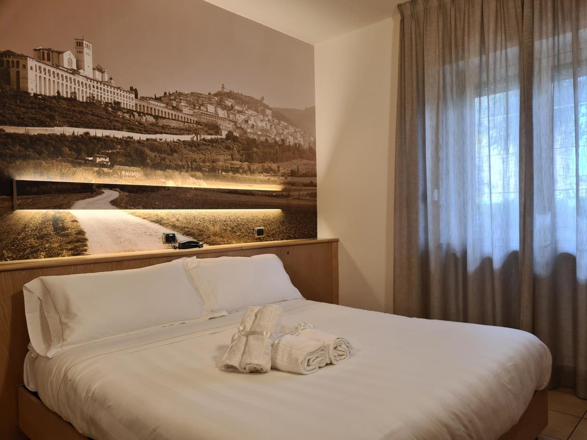 Hotel Cladan Ассизи Экстерьер фото