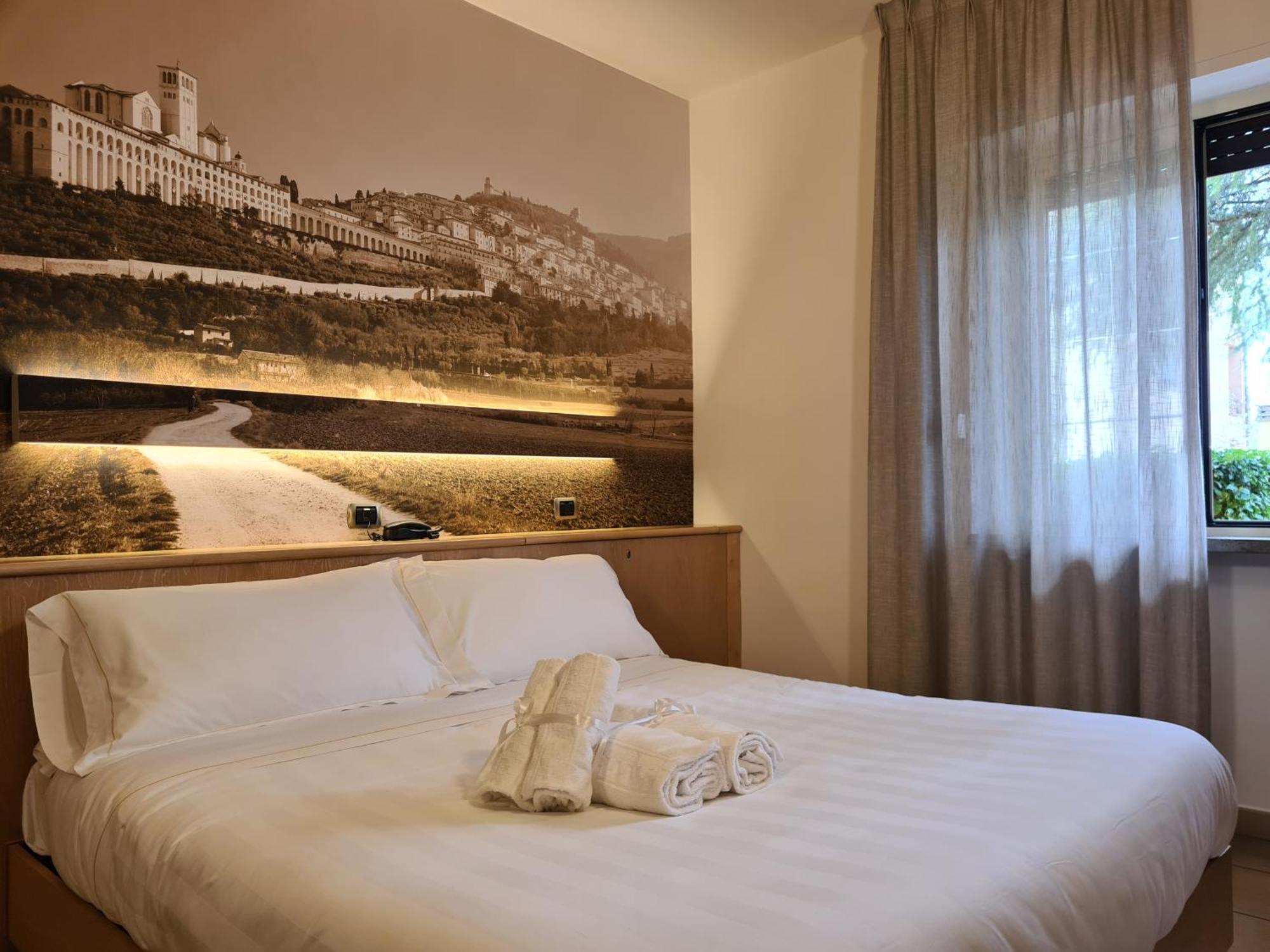 Hotel Cladan Ассизи Экстерьер фото